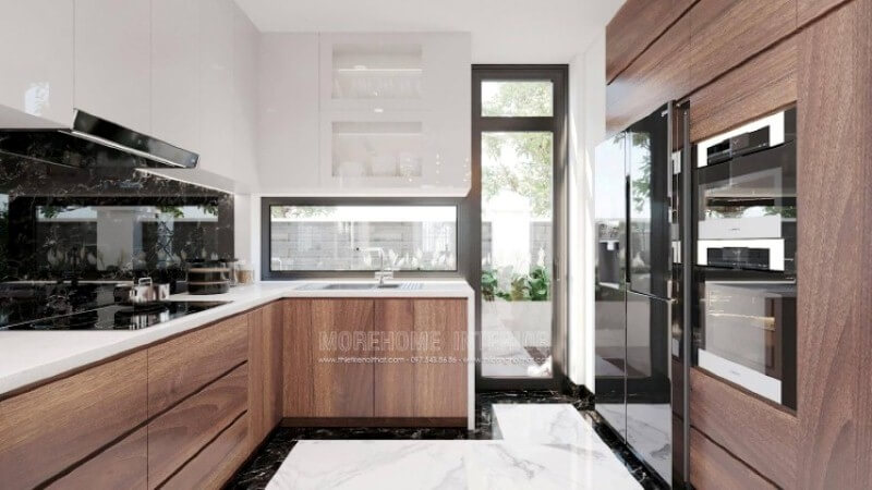 Nếu bạn đã được xem các mẫu tủ bếp đẹp có tay nắm, thì có thể những mẫu tủ bếp đó đã lỗi thời, trang trí phòng bếp với toàn bộ bề mặt cánh tủ trơn nhẵn là một sự thay thế hoàn hảo, không chút tay cầm nhưng lại kéo đẩy dễ dàng nhờ ý tưởng thiết kế vát từ cánh tủ giúp bề mặt gọn gàng mà đẹp mắt. Tủ bếp đẹp